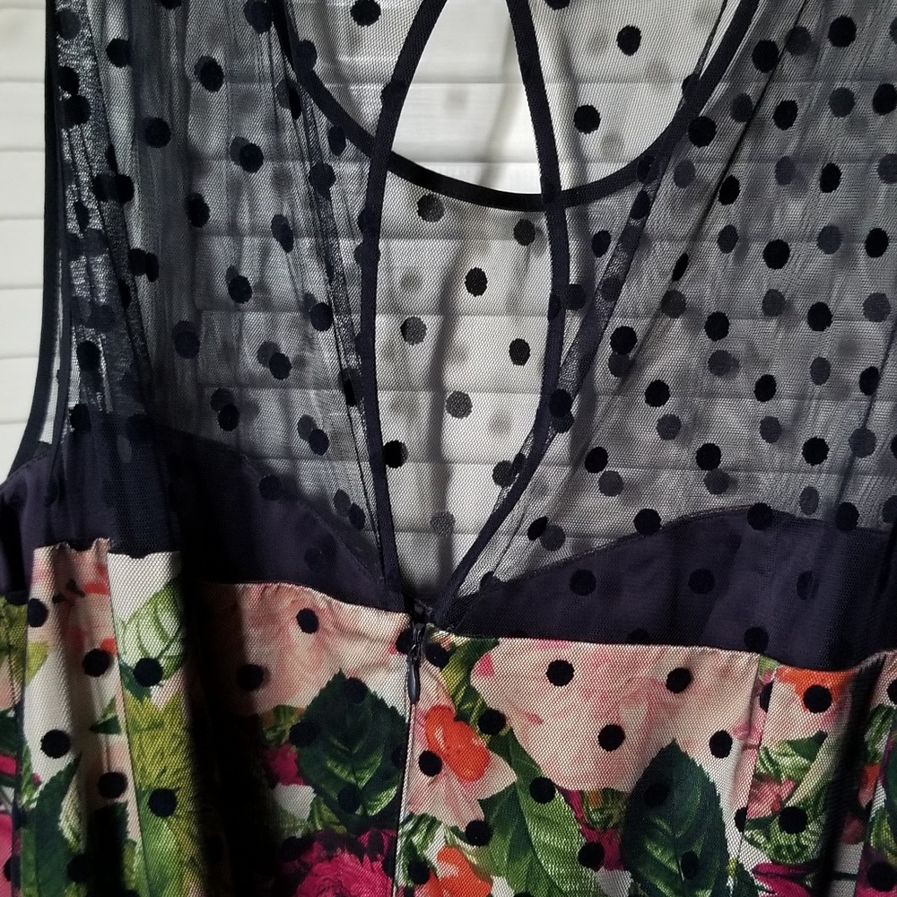Floral navy polka dot overlay with pink belt